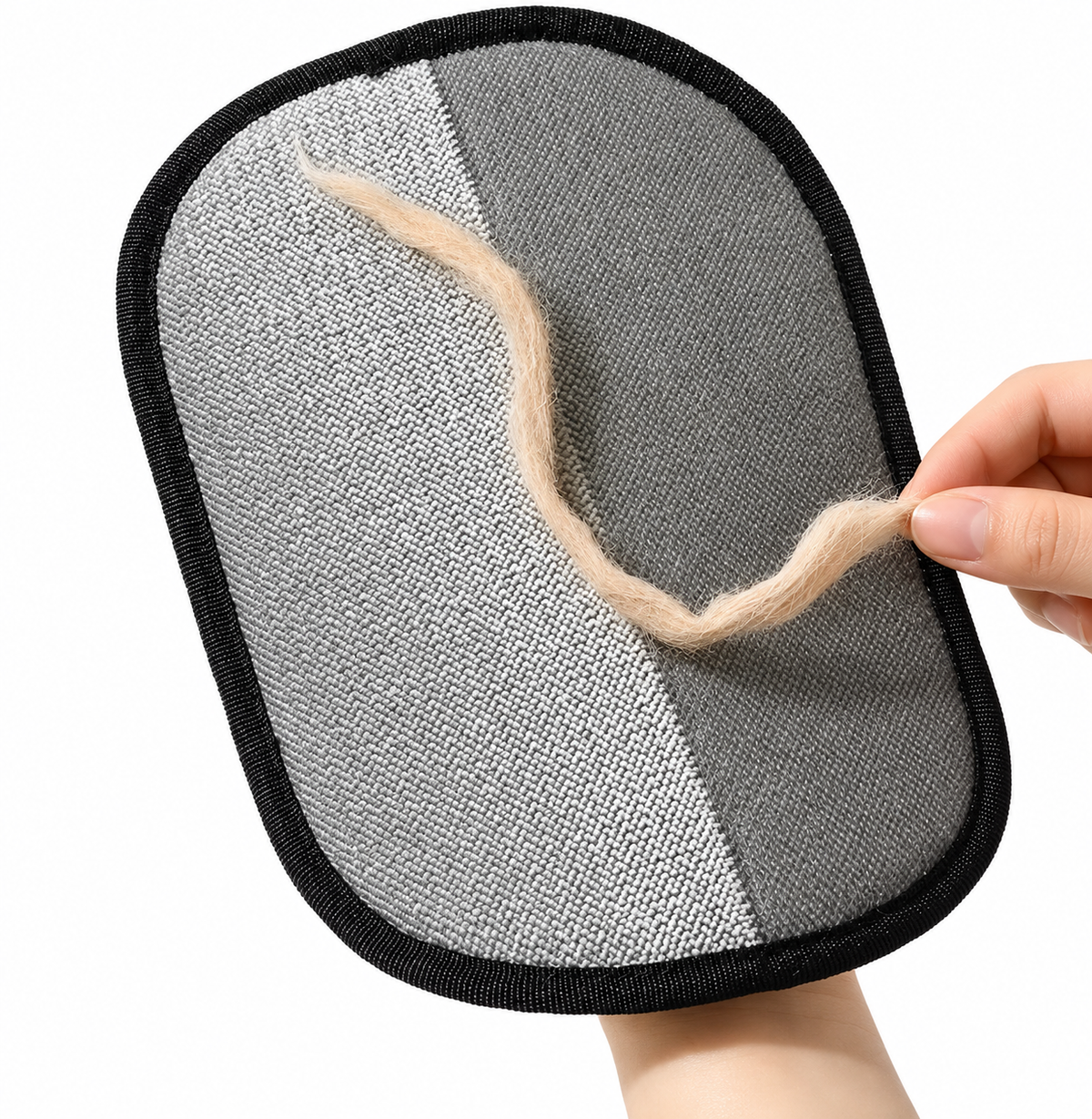 Supplier detail image of the grey fabric hair-removal mitt with black edging and collected hair