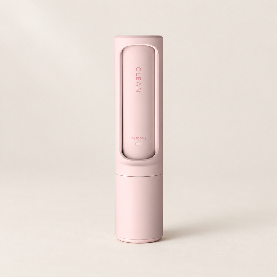 Pocket Clothes Brush on a softly lit neutral background